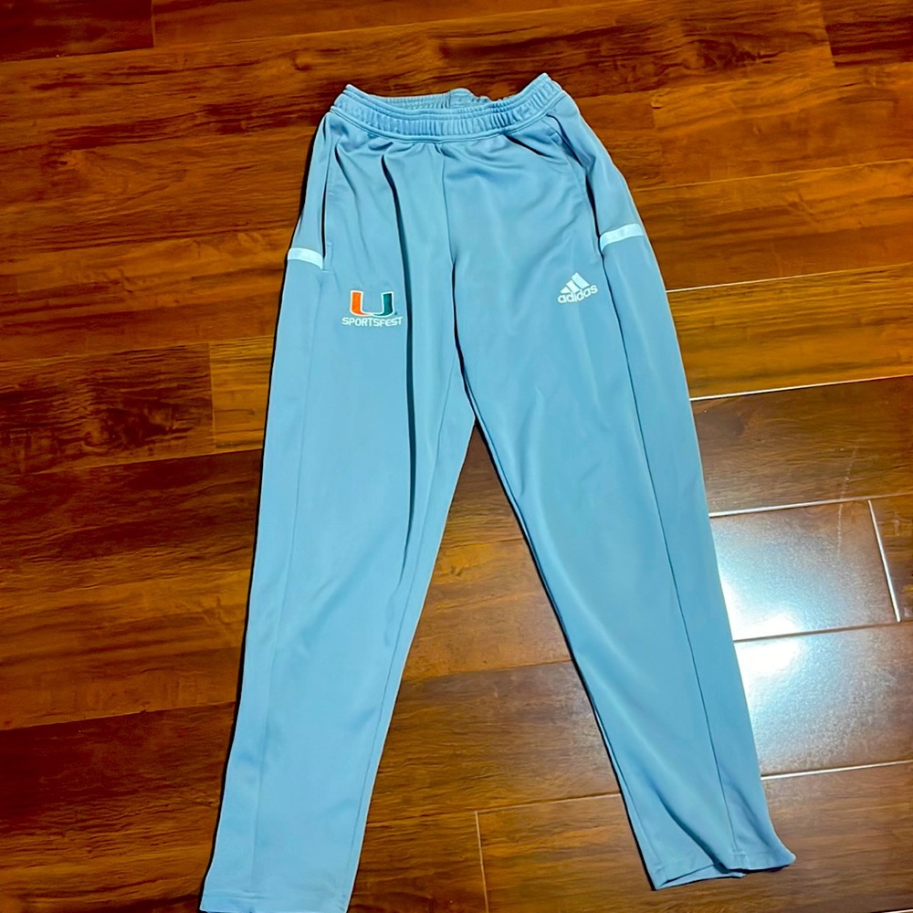 Adidas brand University of Miami sweatpants.